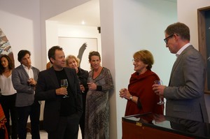 Vik Muniz, Suzanne Landau and Serge Tiroche at the dinner honoring the artist